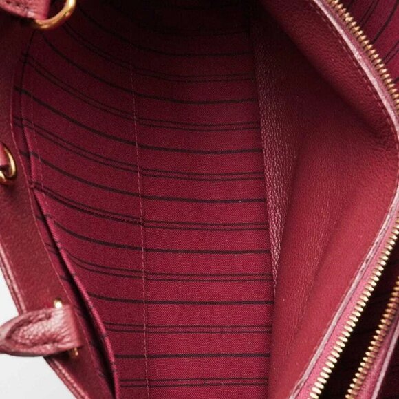 Louis Vuitton Aurore Monogram Empreinte Leather Montaigne MM Bag w/o Strap - Picture 11 of 12